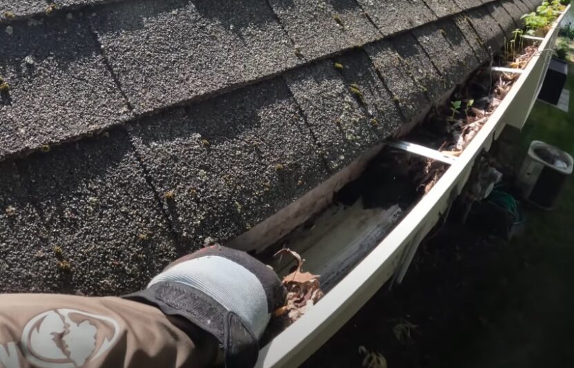 Removing debris from the gutter system