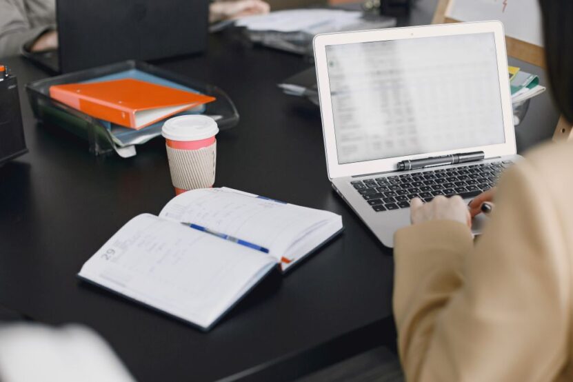 Student preparing translated academic documents for a university application